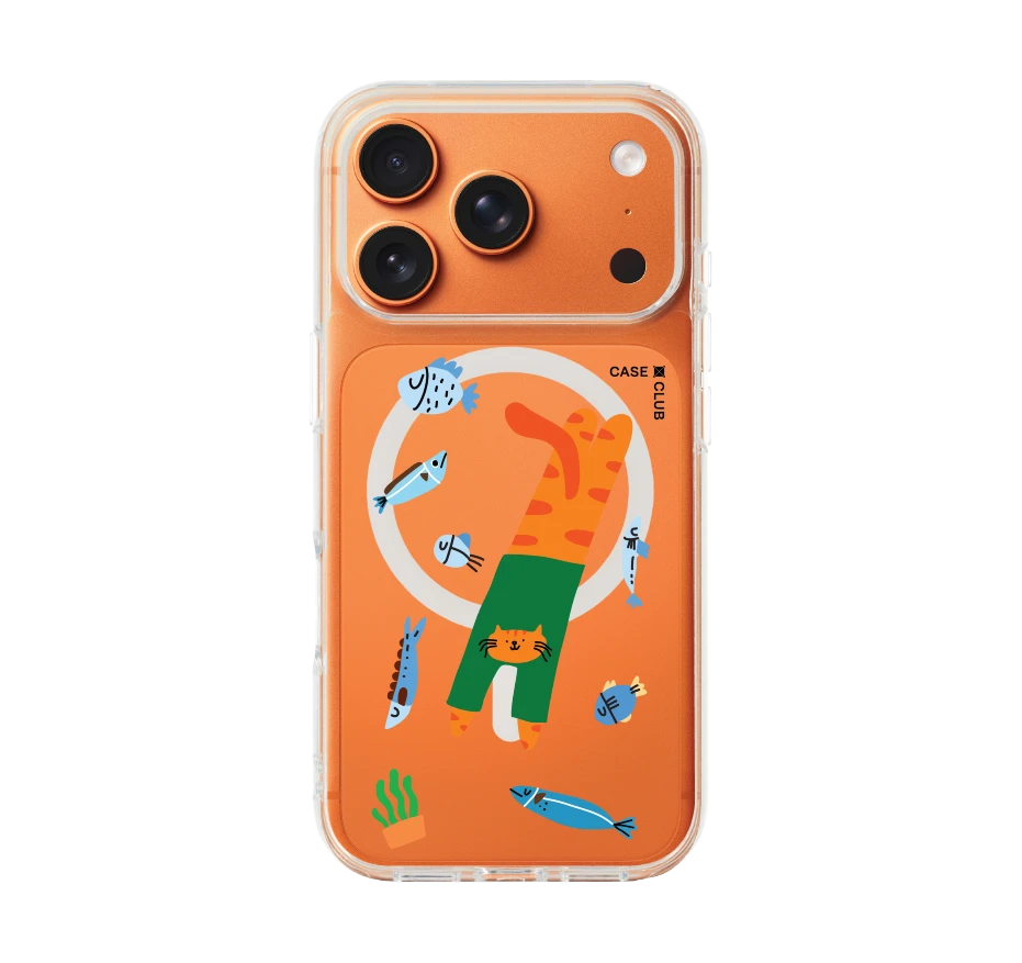 orange cat with green shirt